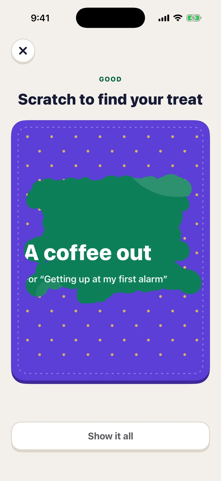 The scratch card in the app, half scratched, showing a treat.