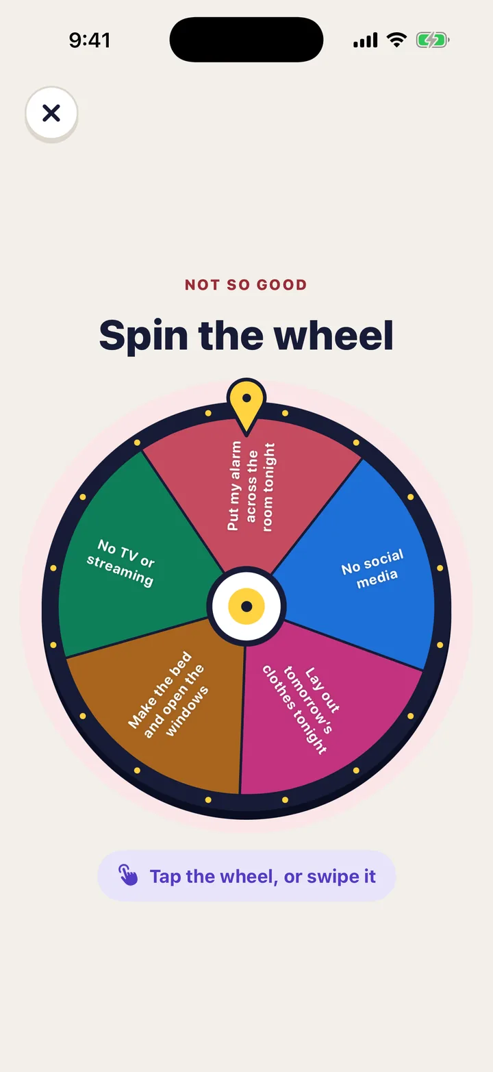 The wheel in the app, about to spin, with the cards written on its slices.